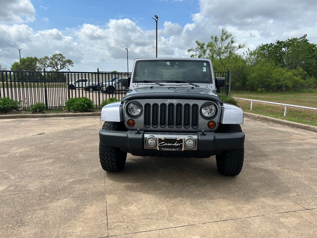 Used 2013 Jeep Wrangler Unlimited Freedom Edition with VIN 1C4BJWDGXDL590874 for sale in Columbus, TX