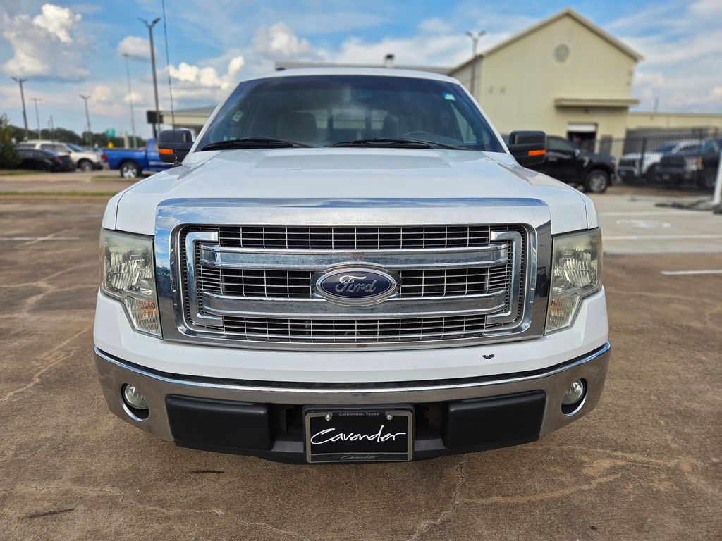 Used 2014 Ford F-150 XLT with VIN 1FTFW1CF3EKE53118 for sale in Columbus, TX