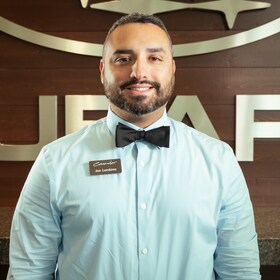 Staff member Jon Londono from 530cb816f358