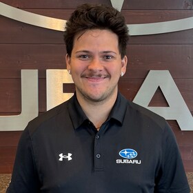 Staff member Alex Ouradnik from 530cb816f358