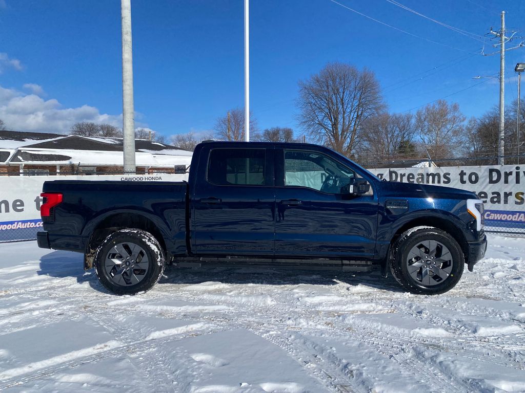 Used 2023 Ford F-150 Lightning Lariat with VIN 1FTVW1ELXPWG09133 for sale in Port Huron, MI