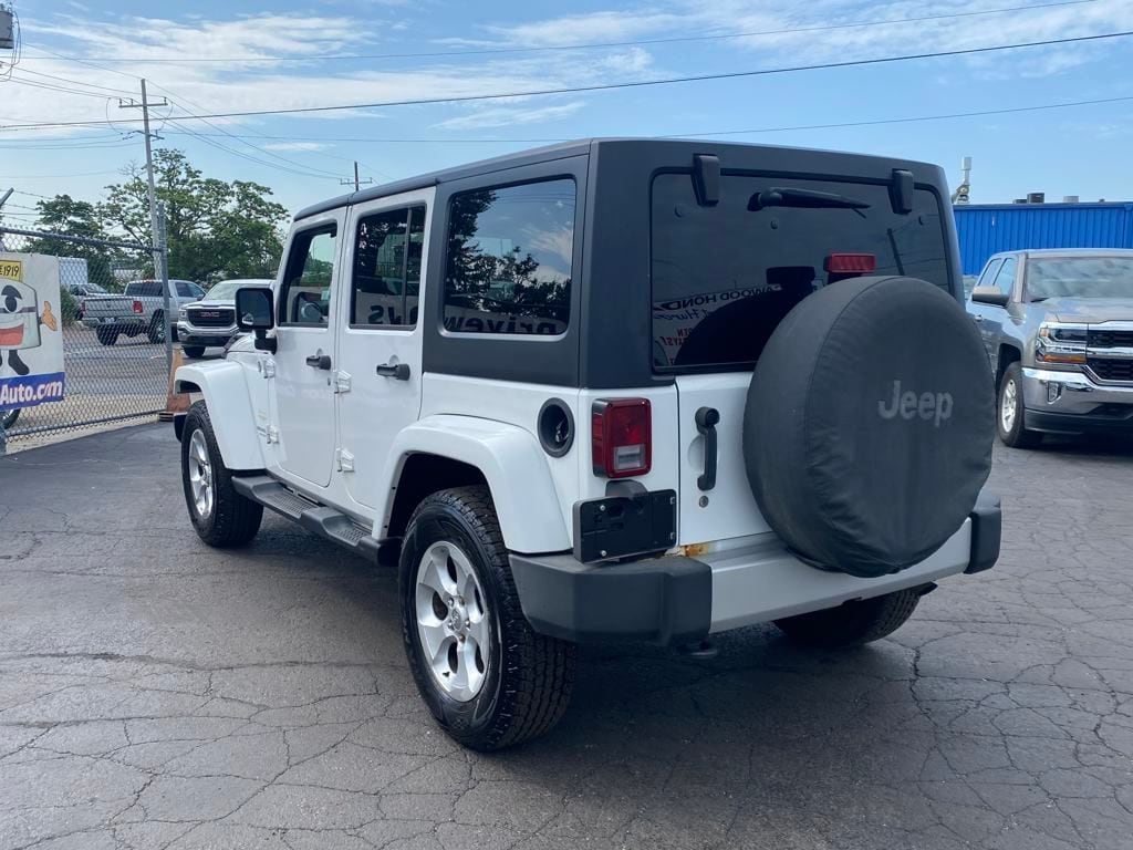 Used 2013 Jeep Wrangler Unlimited Sahara with VIN 1C4BJWEG6DL533151 for sale in Port Huron, MI