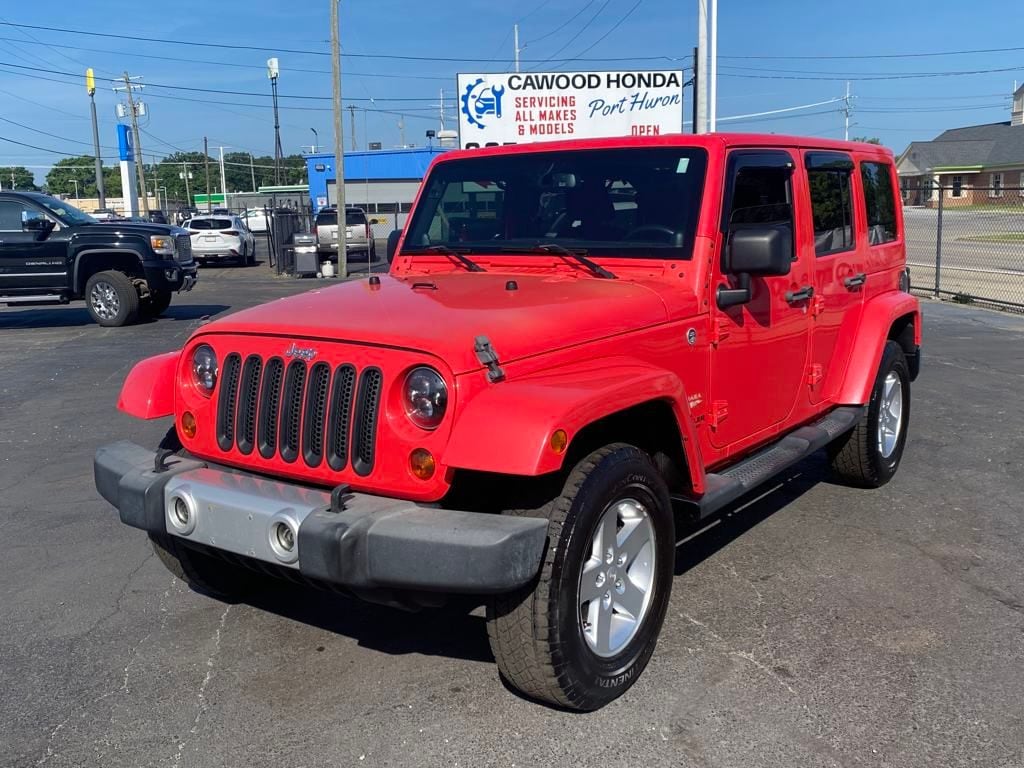 Used 2013 Jeep Wrangler Unlimited Sahara with VIN 1C4BJWEG1DL630984 for sale in Port Huron, MI