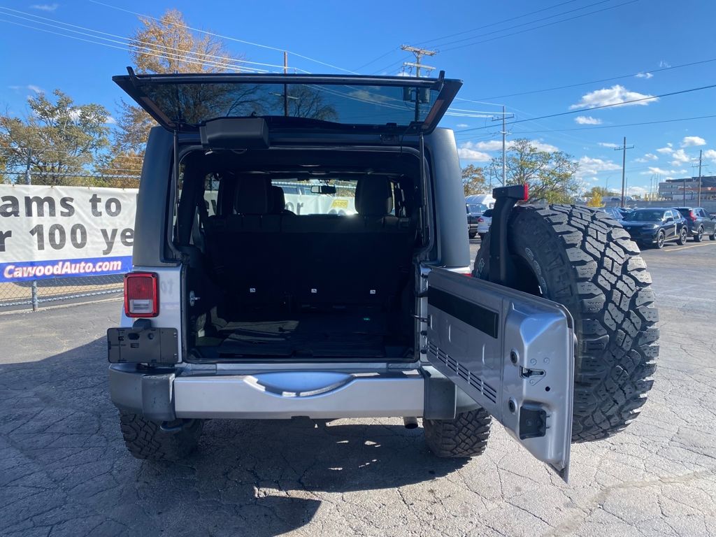 Used 2016 Jeep Wrangler Unlimited Sahara with VIN 1C4HJWEG6GL242177 for sale in Port Huron, MI