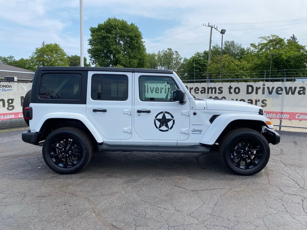 Used 2023 Jeep Wrangler 4xe Sahara with VIN 1C4JJXP64PW573592 for sale in Port Huron, MI