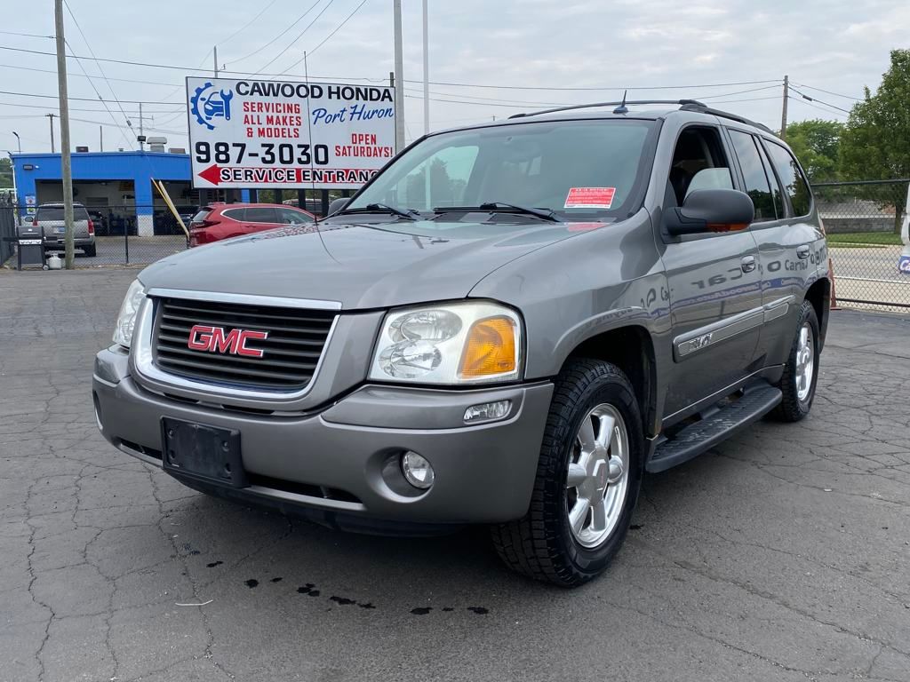 Used 2005 GMC Envoy SLT with VIN 1GKDT13S552111736 for sale in Port Huron, MI