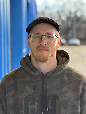 Staff member Adam Lacey from f5a0b3620baf