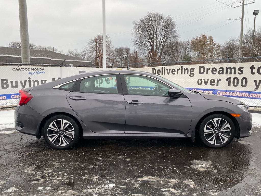 Used 2018 Honda Civic EX-L with VIN 2HGFC1F77JH645531 for sale in Port Huron, MI