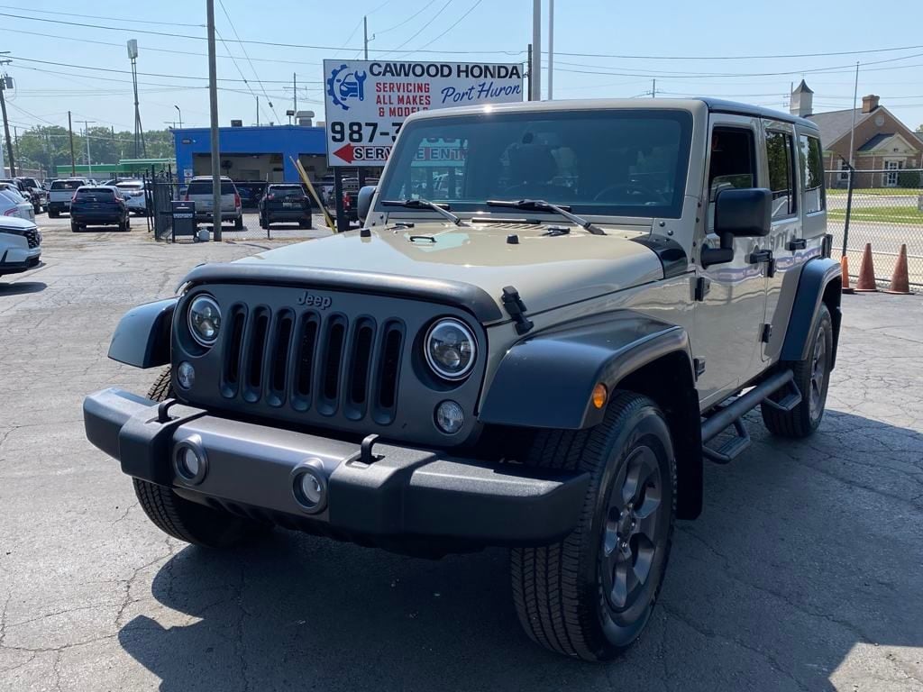 Used 2017 Jeep Wrangler Unlimited Freedom Edition with VIN 1C4BJWDG1HL592521 for sale in Port Huron, MI