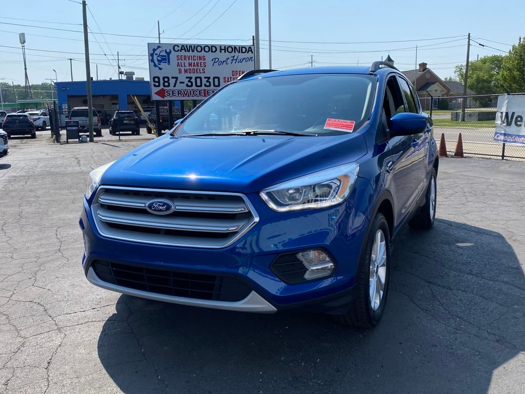 Used 2017 Ford Escape SE with VIN 1FMCU9GD0HUC94899 for sale in Port Huron, MI