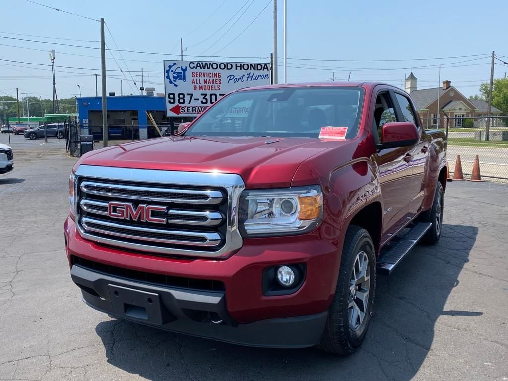 Used 2019 GMC Canyon SLE with VIN 1GTP6CE17K1255810 for sale in Port Huron, MI