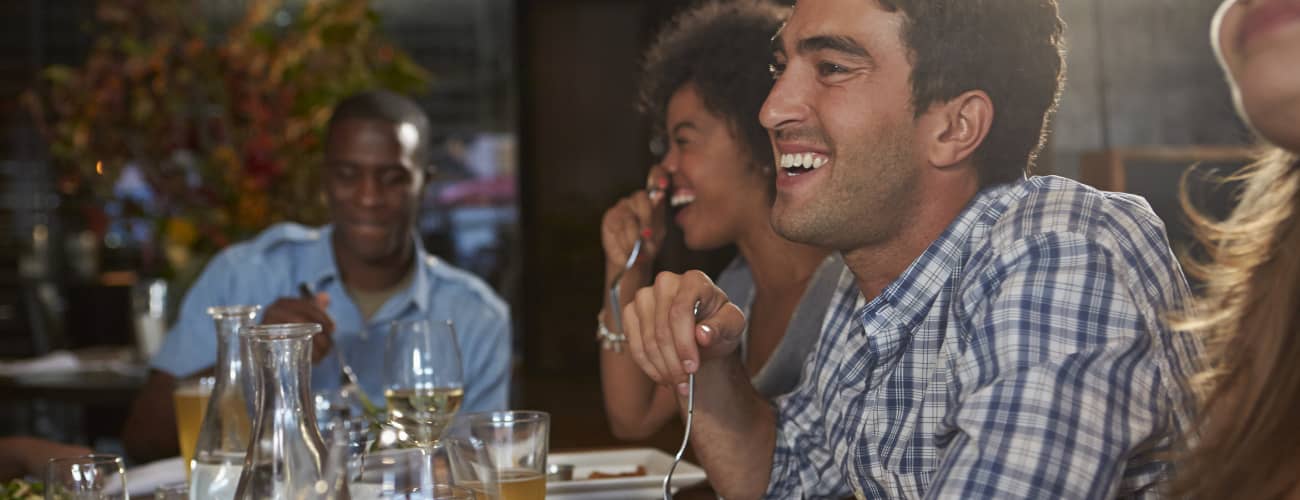friends eating in restaurant
