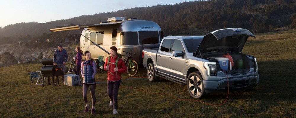 2022 Ford F-150 Lightning with a camper
