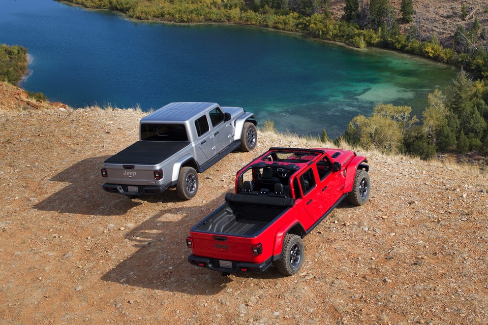 Red and Silver 2021 Jeep Gladiator Parked Off-Road