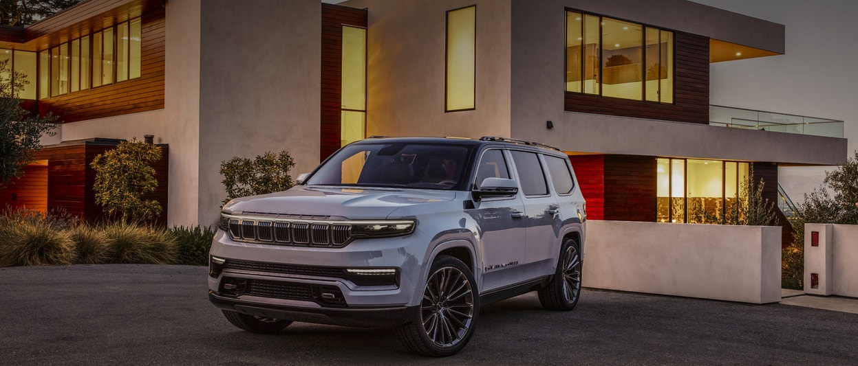 2021 Jeep Grand Wagoneer Parked Outside House