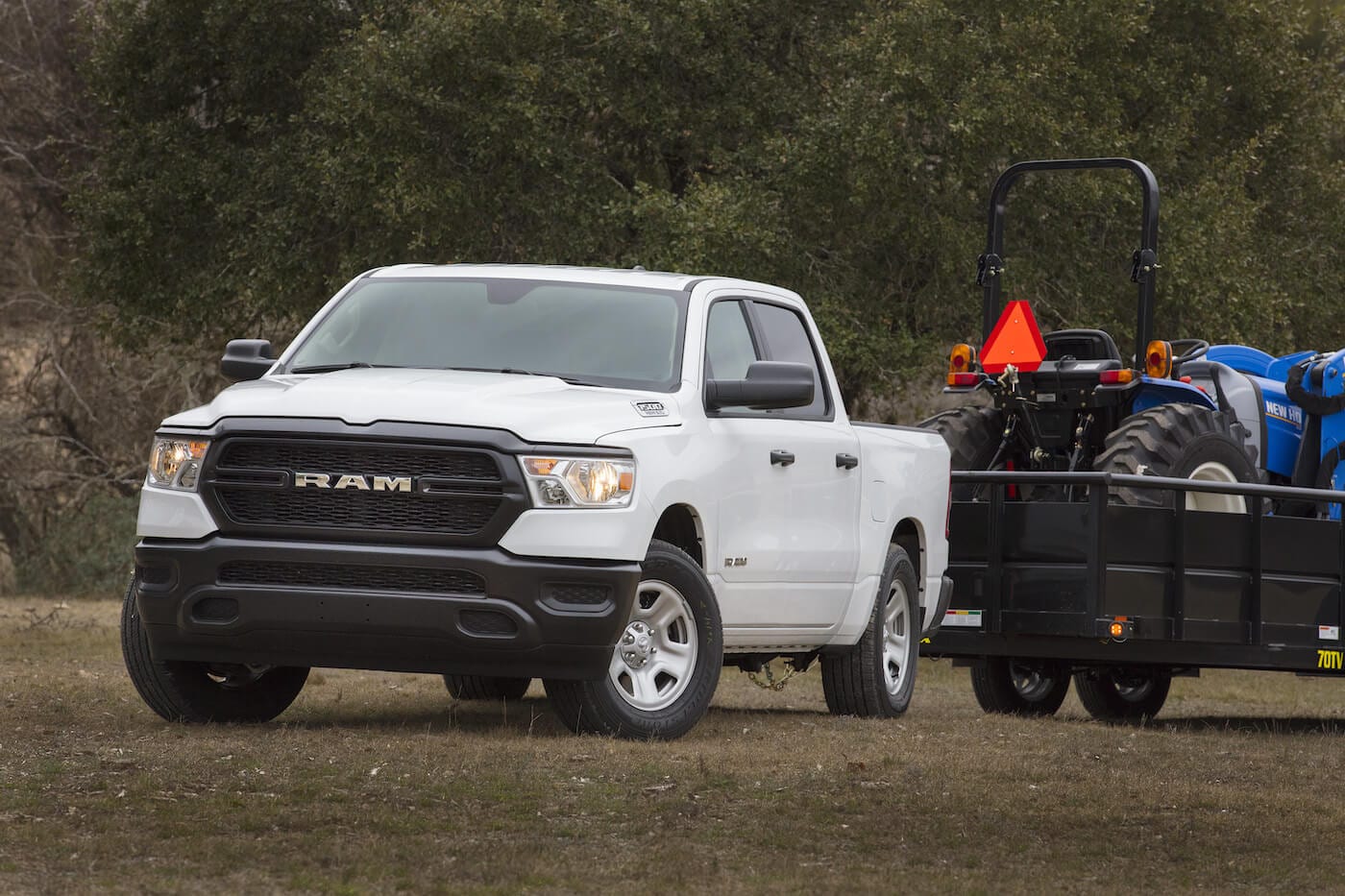 lateral front view of the 2022 RAM 1500 with a trailer