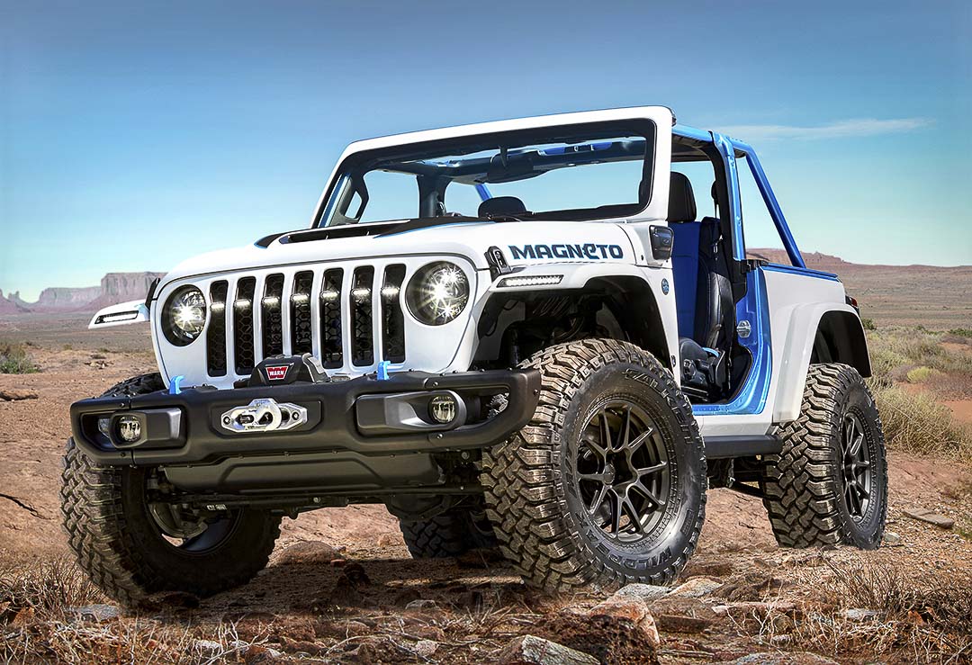 frontal side view of a 2023 Jeep Wrangler Magneto in a canyon