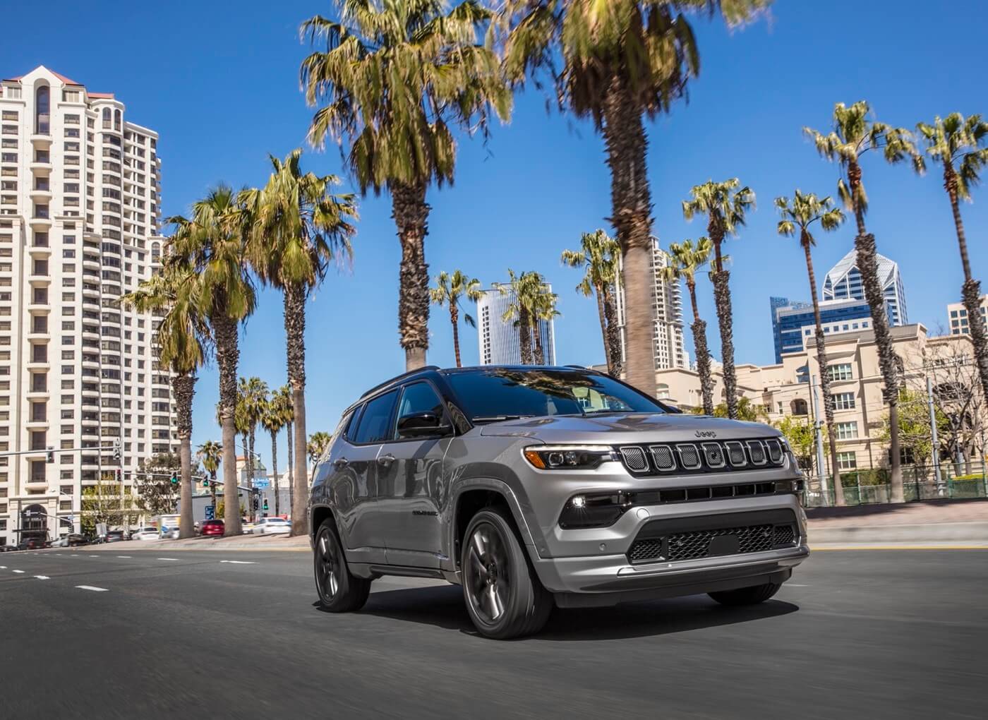 lateral front view of the 2022 Jeep Compass driven on a city street