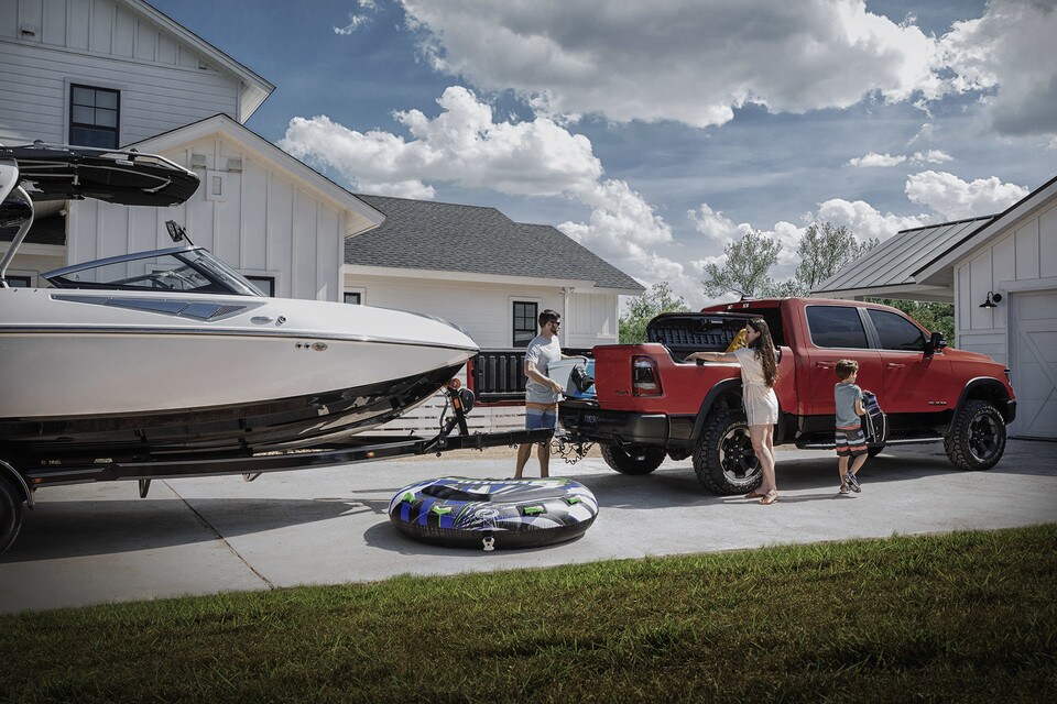 2021 Ram 1500 With A Boat And Family