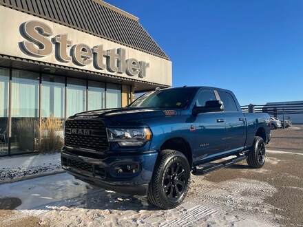 Featured new 2022 Ram 2500 Big Horn 4x4 Crew Cab 6.3 ft. box 149 in. WB for sale in Stettler, AB