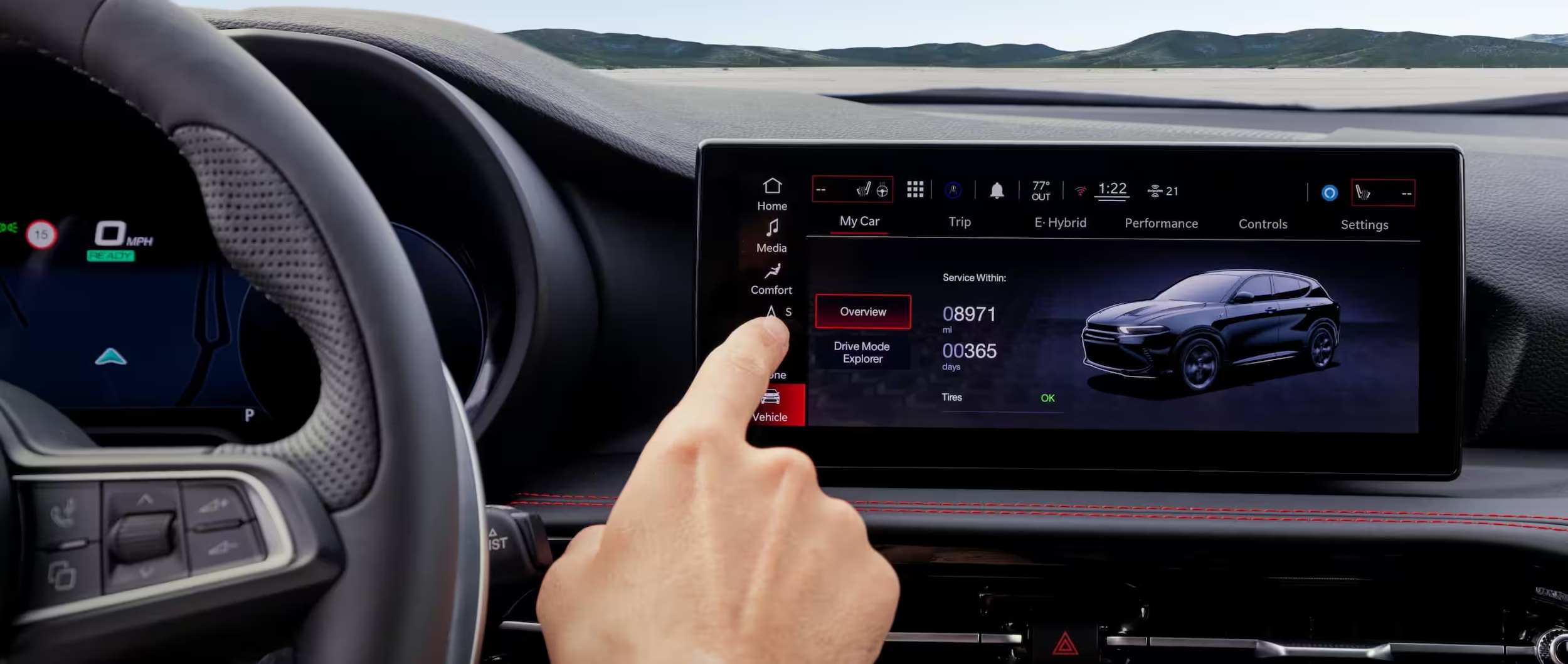 An image showing an infotainment screen displaying the Uconnect® system