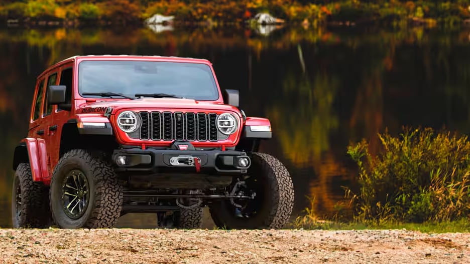 A Jeep Wrangler driving on the trail