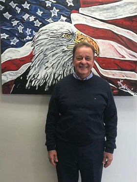 Staff member John "JP" Povonda from b44560c325f2