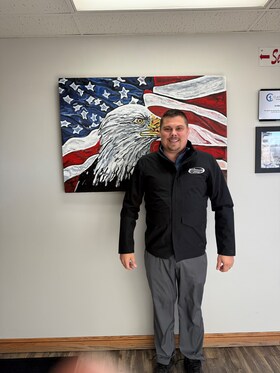 Staff member Justin Crum from b44560c325f2