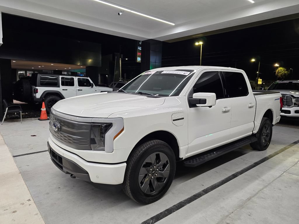 Used 2023 Ford F-150 Lightning Lariat with VIN 1FTVW1EL5PWG20394 for sale in Tampa, FL
