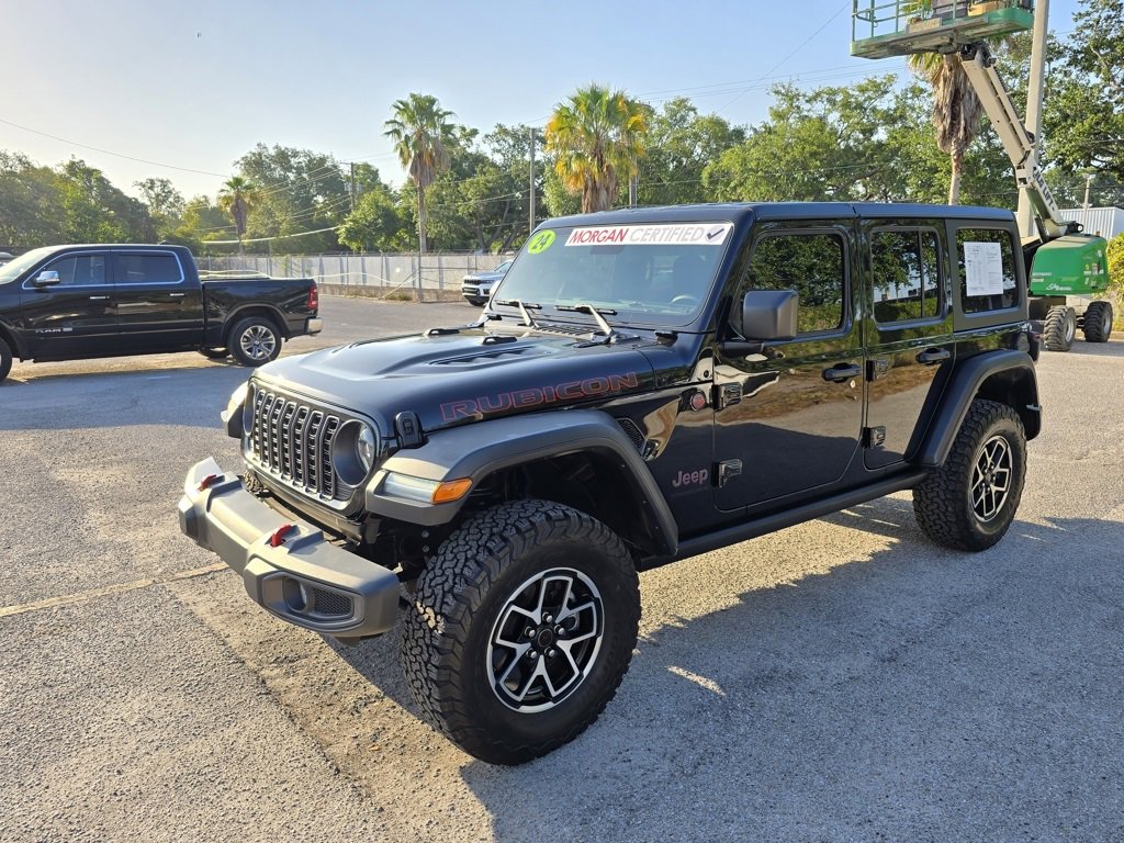 Used 2024 Jeep Wrangler 4-Door Rubicon with VIN 1C4PJXFG6RW170415 for sale in Tampa, FL