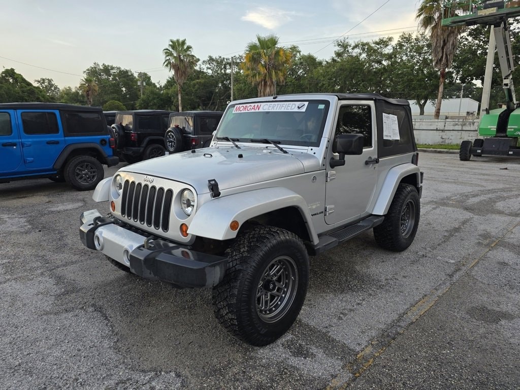 Used 2011 Jeep Wrangler Sahara with VIN 1J4AA5D19BL506732 for sale in Tampa, FL