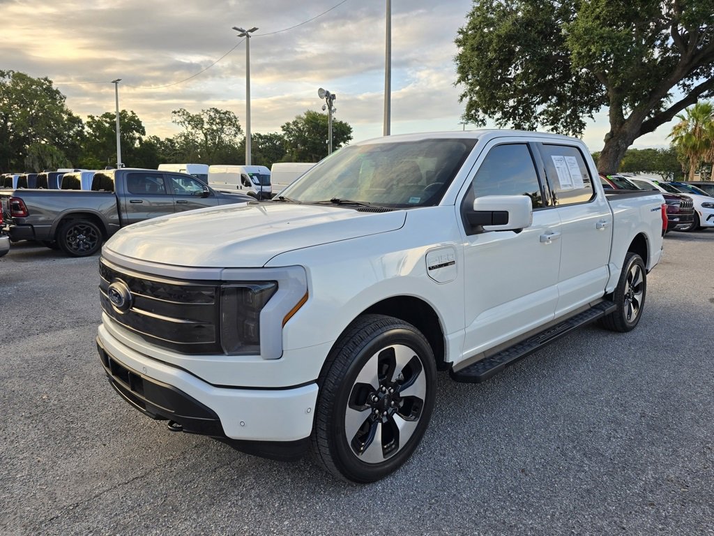 Used 2022 Ford F-150 Lightning Platinum with VIN 1FT6W1EV4NWG06621 for sale in Tampa, FL