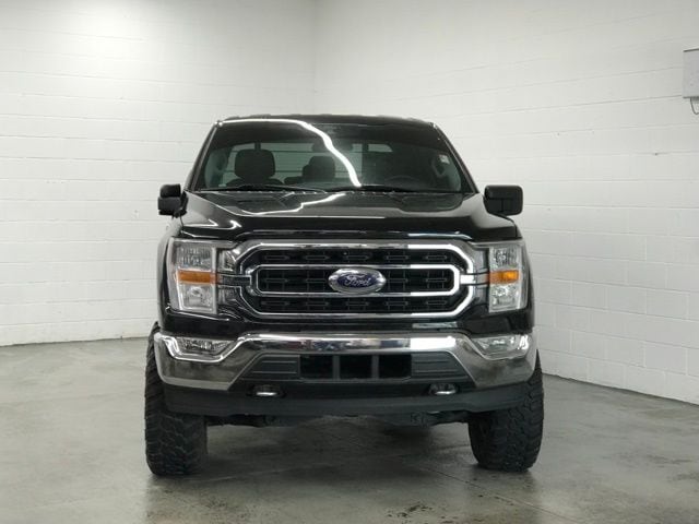 Used 2021 Ford F-150 XLT with VIN 1FTFW1E56MFB89713 for sale in Willoughby, OH