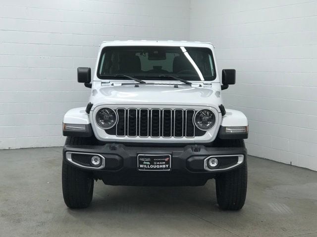 Used 2025 Jeep Wrangler 4-Door Sahara with VIN 1C4PJXENXSW529352 for sale in Willoughby, OH