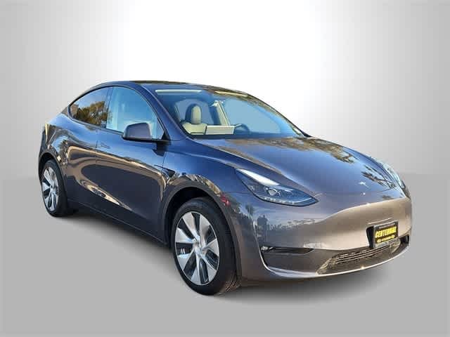 Used 2023 Tesla Model Y Base with VIN 7SAYGDED9PF963074 for sale in Kansas City
