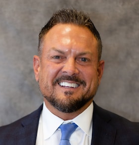 Staff member Mark Santos from 67741168b70a