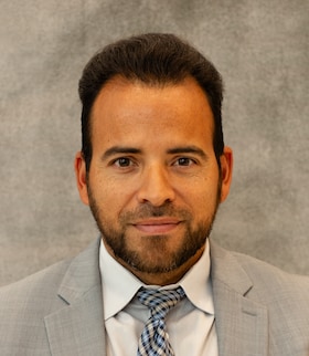 Staff member Jay Cisneros from 57b6b8b0b911