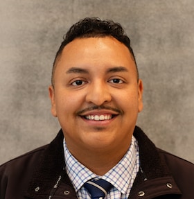 Staff member Alex Garcia from 57b6b8b0b911