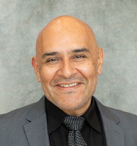 Staff member Johnny Quintero from 57b6b8b0b911