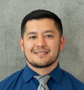 Staff member Armando Estrada from 57b6b8b0b911