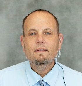 Staff member Nicholas Greene from ae949005ec15