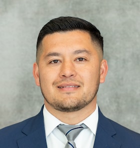 Staff member Armando Estrada from 57b6b8b0b911