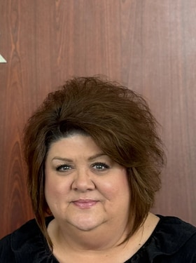 Staff member LESLIE LEATHERS from 2e4863a84c98