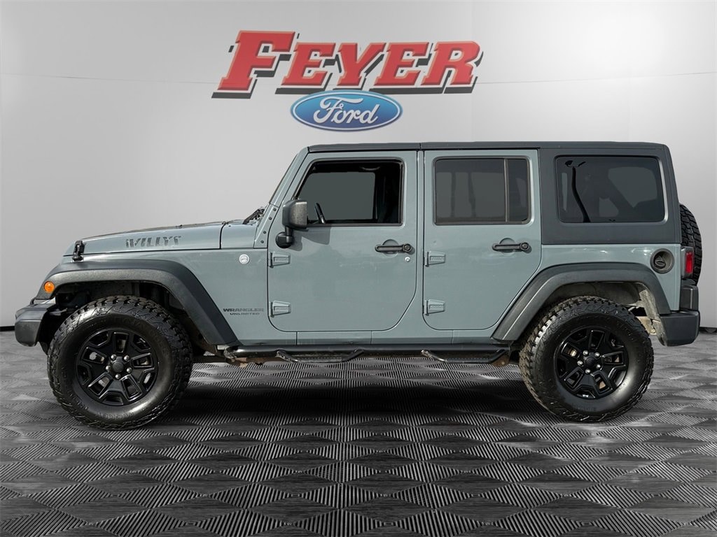Certified 2014 Jeep Wrangler Unlimited Willys Wheeler SUV