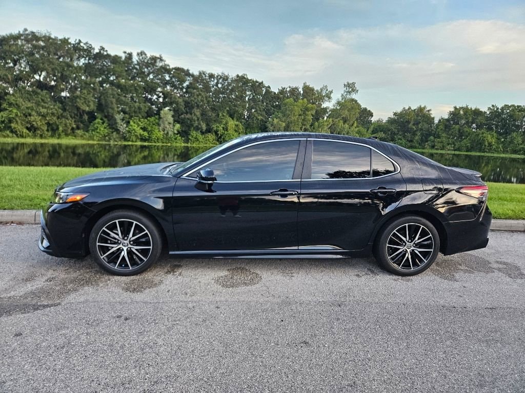 Used 2023 Toyota Camry SE with VIN 4T1G11AKXPU727081 for sale in Orlando, FL