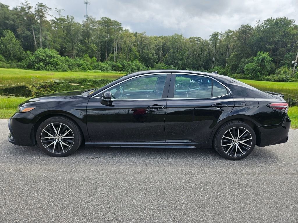 Used 2023 Toyota Camry SE with VIN 4T1G11AK5PU729790 for sale in Orlando, FL