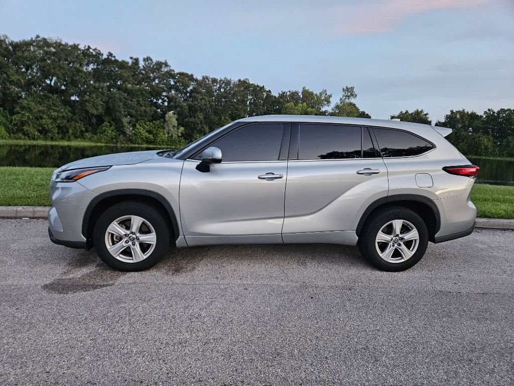 Used 2021 Toyota Highlander LE with VIN 5TDZZRAH0MS079890 for sale in Orlando, FL