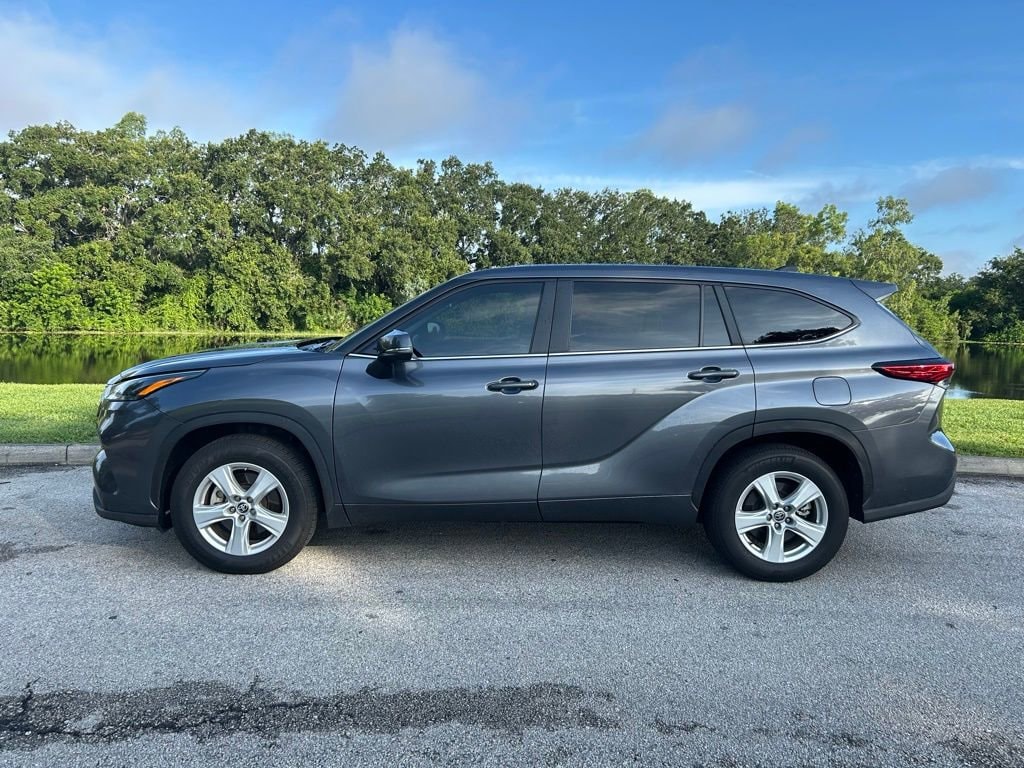 Used 2023 Toyota Highlander LE with VIN 5TDKDRAH9PS041966 for sale in Orlando, FL