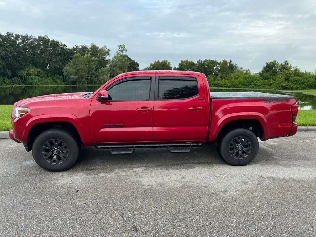 Used 2022 Toyota Tacoma SR5 with VIN 3TMCZ5AN3NM488410 for sale in Orlando, FL