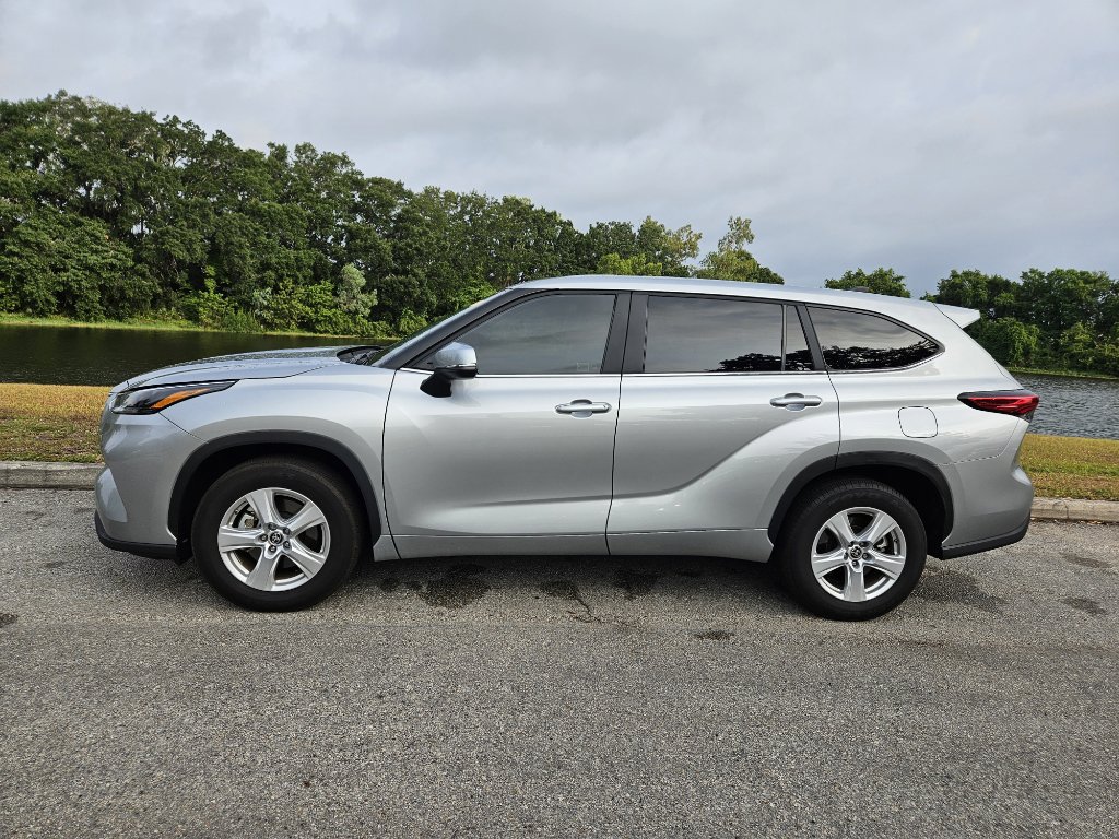 Used 2023 Toyota Highlander LE with VIN 5TDZARAH0PS017949 for sale in Orlando, FL